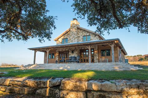 A Texas farmhouse with a wraparound porch